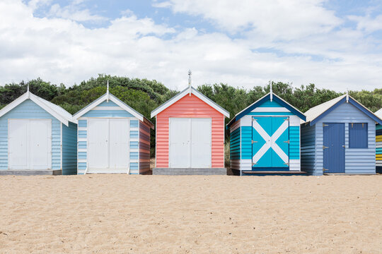 Row of brightly painted beach huts in Brighton Beach Australia