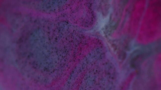 Acrylic overflow. Wavy liquid. Grunge stream with pink spots metal sparkle. Emergence of contrasting dye clots glitter washing canvas surface.