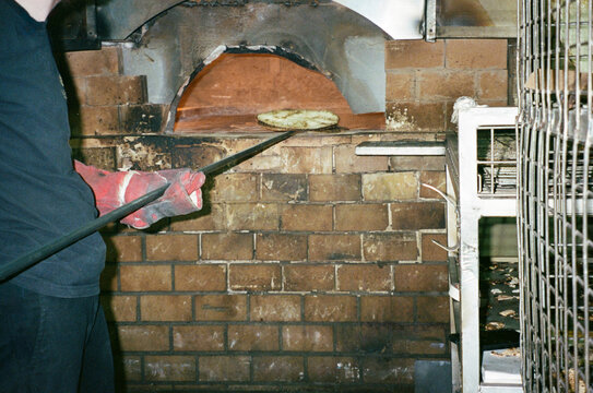 Making Matzah in a Traditional Oven at a Bakery Shot On Analog Film.