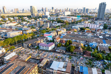 Aerial view of Bangkok skyline during sunset.
