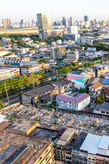 Aerial view of Bangkok skyline during sunset.