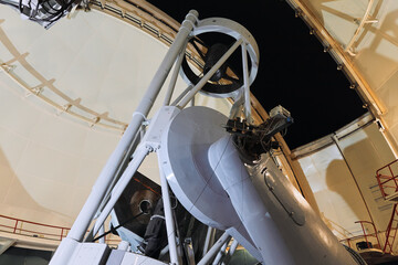 Astronomical observatory telescope with metal object on top for deep space exploration