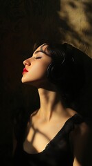 Beautiful young woman listening to music with headphones in the dark, beauty and youth, listening to music