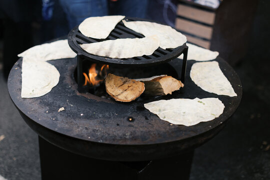 cooking cheburek on the food market