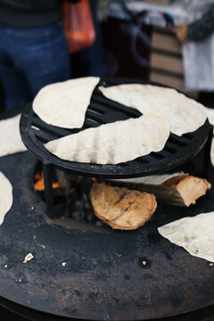 cooking cheburek on the food market