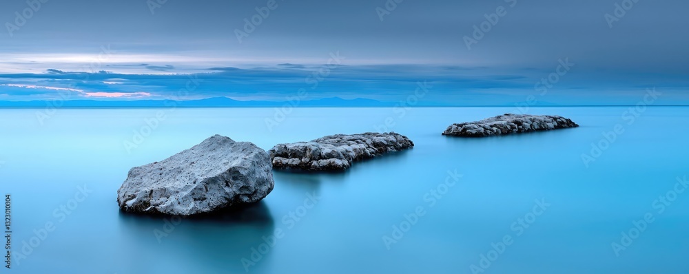 Poster seascape abstract background concept. serene seascape with tranquil waters and three distinct rock f