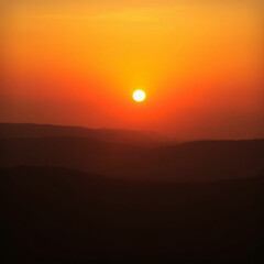 Fototapeta premium Breathtaking sunset over a tranquil landscape