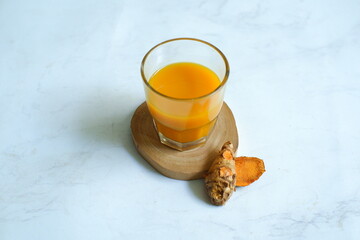 glass of turmeric herbal drink 