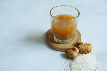 A glass of herbal drinks or jamu tradisional 