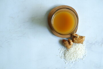 Glass of jamu or herbal drink 