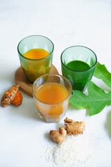 cup of traditional healthy drink or jamu 