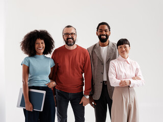 Diverse Group of Smiling Professionals Standing Together 
