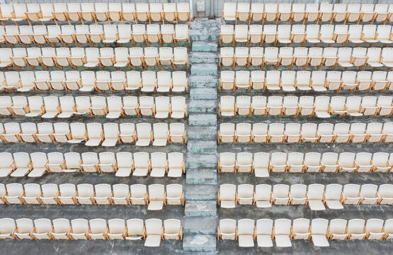 Outdoor Amphitheater Rows of White Folding Chairs