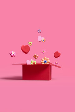 Flowers and hearts fly in a gift box on a pink background
