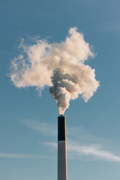 Industrial Chimney Emitting Smoke