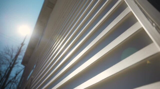 White siding house wall with modern panels, providing a sleek and classic exterior look. Wide move camera view