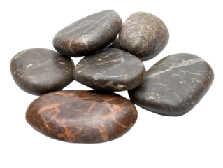 A collection of smooth, dark stones arranged artistically for a calming aesthetic, perfect for relaxation or meditation.