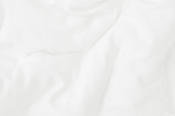 Obraz premium Texture of white blanket and bedding sheet with crumpled or messy in bedroom after wake up.