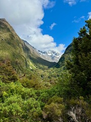 Milford Sound New Zealand snow capped mountains and valleys