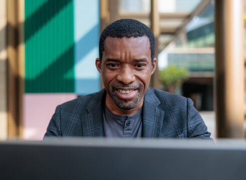 Freelancer smiling during video call
