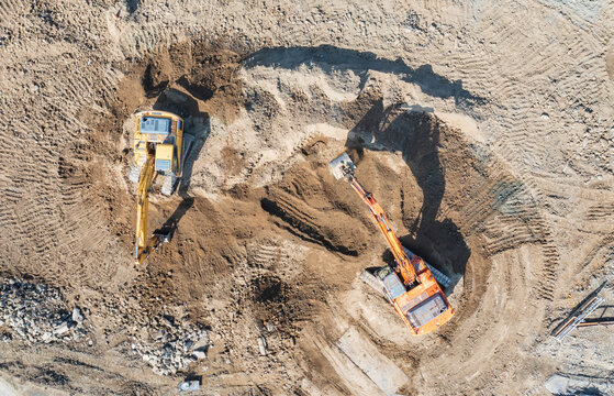 Aerial View Excavators Working on Construction Site Dirt