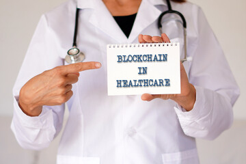 blockchain in healthcare. medical concepts. doctor pointing out the words in a notebook