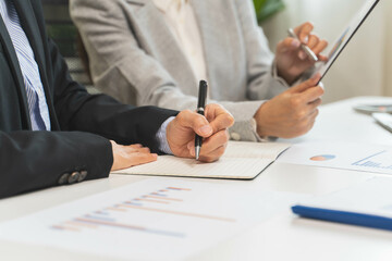 Financial consult planning investor asses and present to client, Close up shot client and advisor...