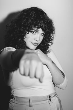 Fototapeta Confident Curvy Woman with a Boxing Pose in Black and White
