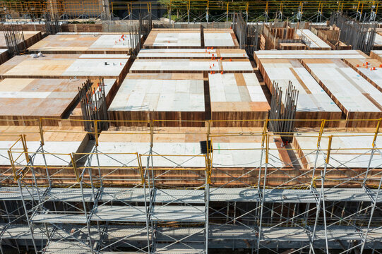Construction Site Aerial with Wooden Forms and Scaffolding.