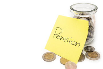 PENSION text on sticky note. Thai Baht Coins spilled out of jar glass isolated on white background,...