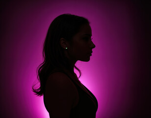 silhouette of a young woman with a pmik background