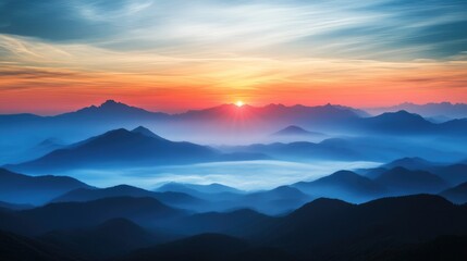 Fototapeta premium A beautiful sunrise over a range of mountain silhouettes