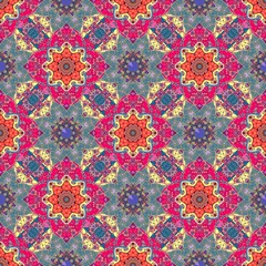 Diagonal ornament with multicolored mandalas. Seamless pattern for fabric in ethnic style.