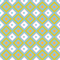 Colorful diamond pattern featuring vibrant yellow, pink, and green shapes against a white background, creating a lively textile design.