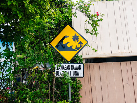 Tsunami warning sign near residential area in Indonesia