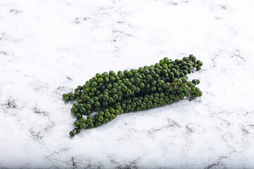 Fresh ripe green peppercon heap