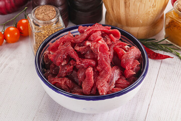 Raw beef meat - sliced strips