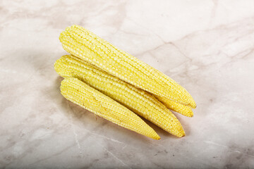 Raw sweet baby corn heap
