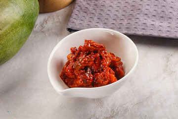 Spicy pickled raw green mango