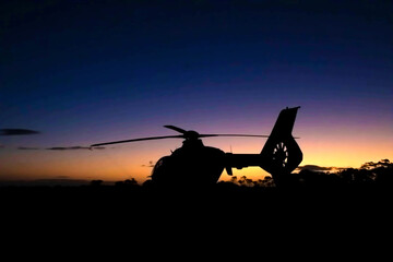 helicopter in the sunset
