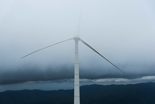 Spinning Wind Turbines in the fog