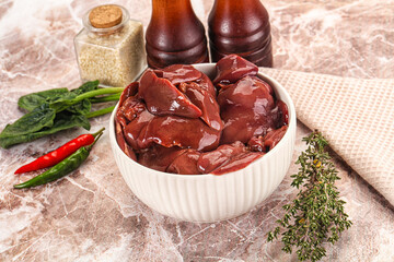 Raw uncokked chicken liver in the bowl