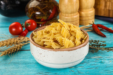 Raw dry farfalle for cooking
