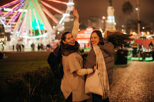 Waving Goodbye at a Festive Holiday Market