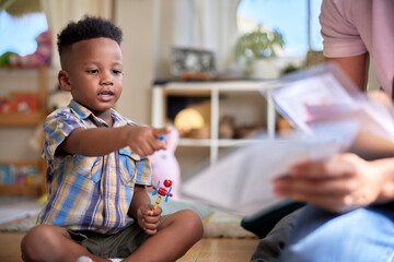 Little boy learning with flashcards