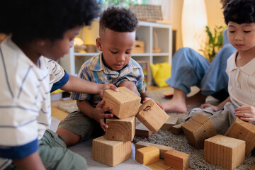 Kids playing together in kindergarten