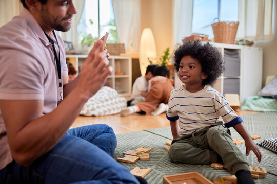 Toddler waiting for teacher to ask a question