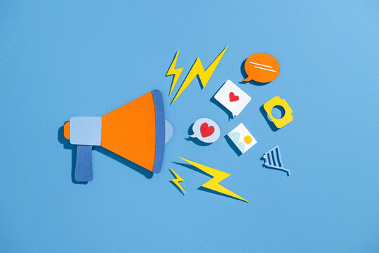 Colorful Social Media Icons with Megaphone on Blue Background