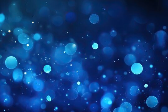 Fototapeta Abstract dark blue bokeh background with light particles