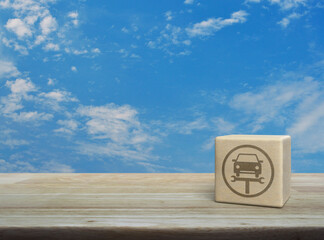 Service fix car with wrench tool icon on wood block cube on wooden table over blue sky with white clouds, Business repair car service concept
